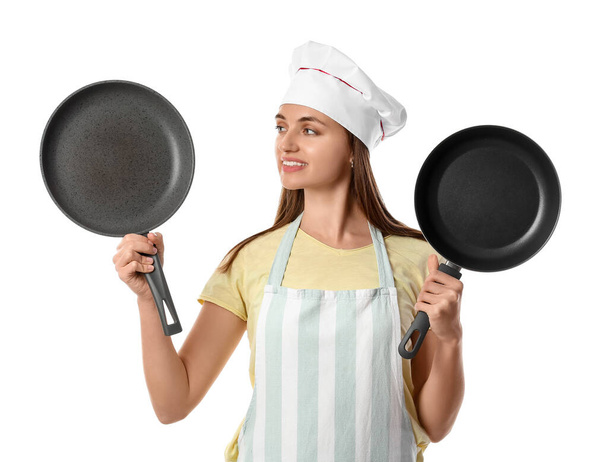 Chef femenino con sartenes sobre fondo blanco - Foto, Imagen