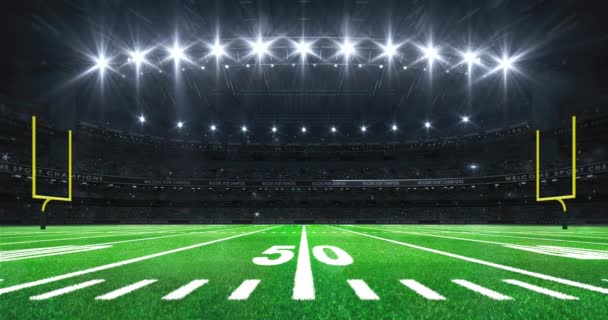 American football stadium with yellow goal posts on sides, grass field and glowing spotlights and camera flashes. Sport advertisement 4K video loop. - Footage, Video