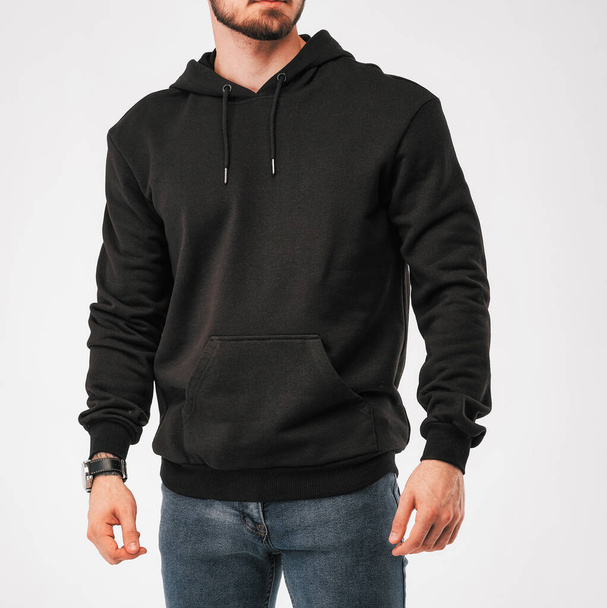 the man wears a black hoodie. isolated clothing mockup photo - Photo, Image