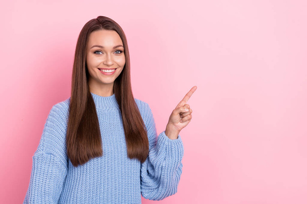 Photo of cute millennial brown hairdo lady index promo wear blue pullover isolated on pink color background - Photo, Image