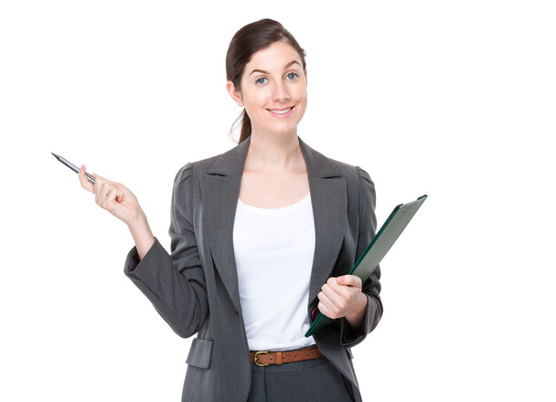 Businesswoman with clipboard and pen - Photo, Image