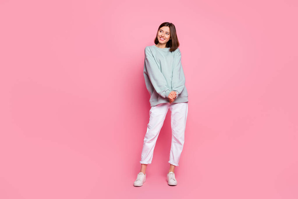 Full body photo of young pretty lady wonder look empty space modern outfit isolated over pink color background - Φωτογραφία, εικόνα