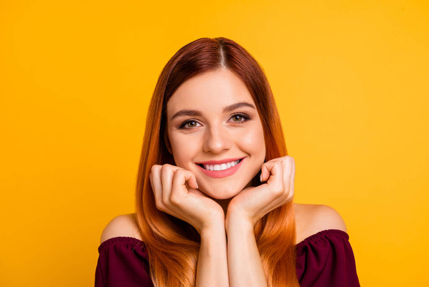 Photo of satisfied glad young person hands touch cheeks toothy beaming smile isolated on yellow color background - Photo, image