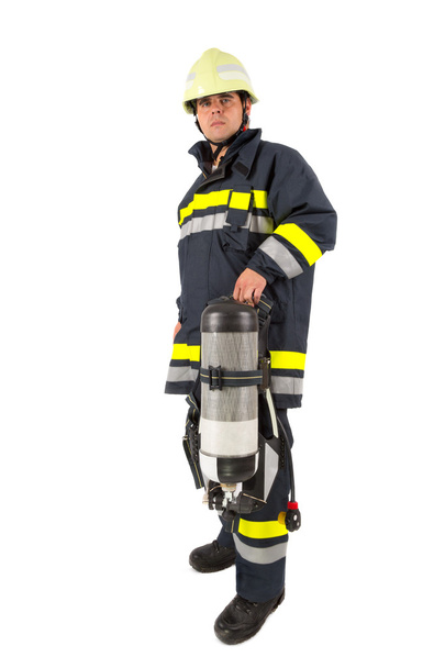 Fireman in uniform isolated in white - Φωτογραφία, εικόνα