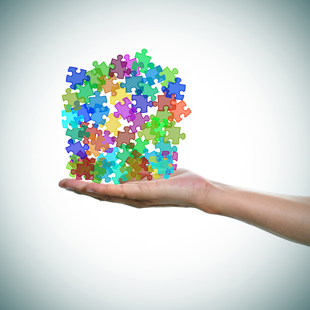 кусочки головоломки разных цветов, как символ аутизма
 - Фото, изображение