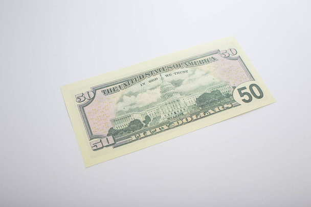 money dollar bills on a white background - Фото, зображення