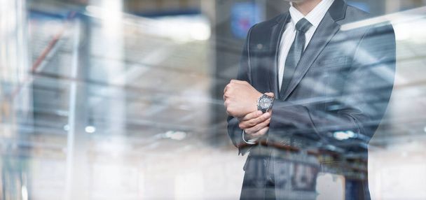 Business time concept. Businessman adjusting his wristwatch on his hand. - Foto, immagini