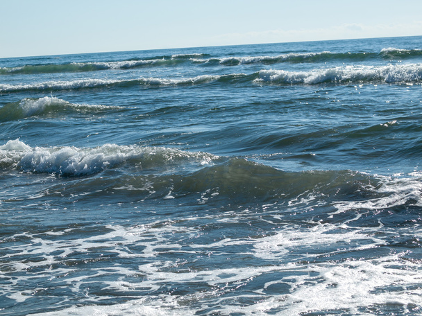 Океанічні хвилі на сонячний день
 - Фото, зображення