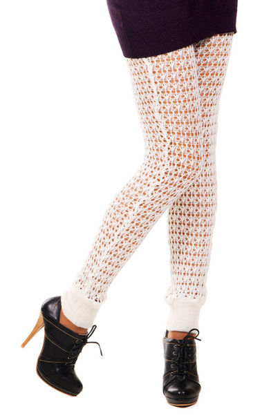 Жіночі ноги в в'язаних легінсах
 - Фото, зображення