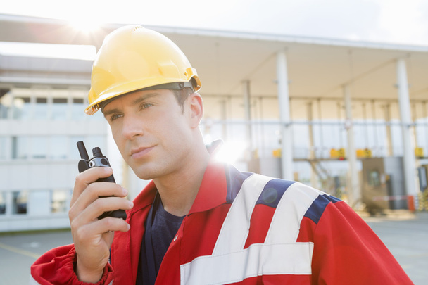 Worker using walkie-talkie - Foto, Imagen
