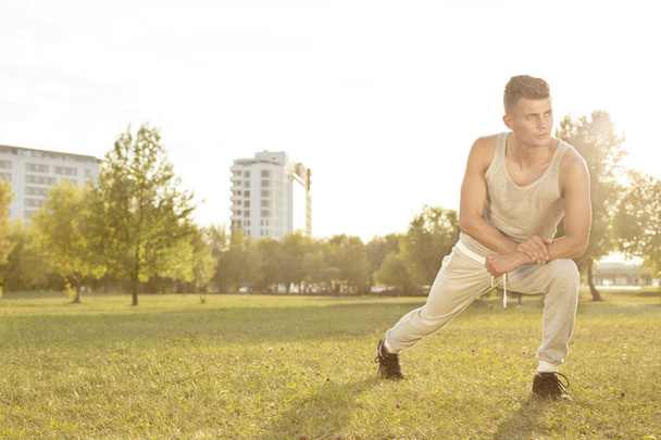man exercising in park - Fotó, kép