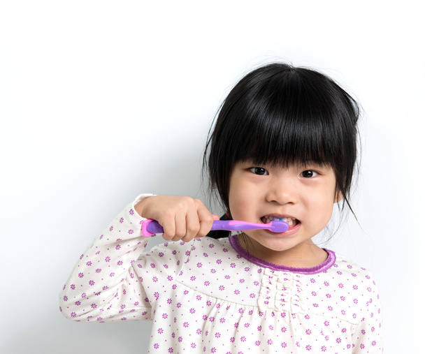 Spazzolatura denti bambino - Foto, immagini