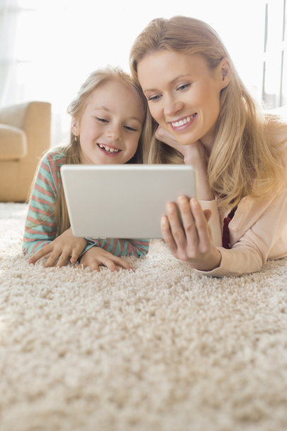 Mother and daughter using digital tablet - Foto, Imagem