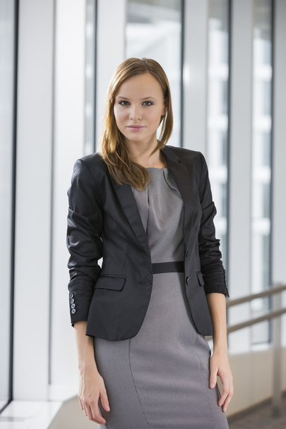 businesswoman standing in office - Photo, Image