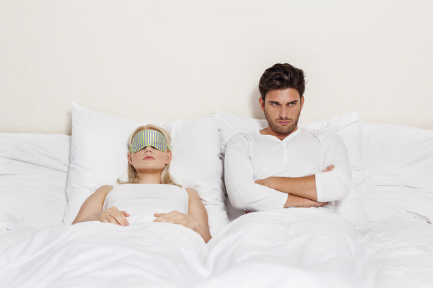 Man with woman sleeping in bed - Photo, Image