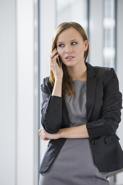 Businesswoman using cell phone - Photo, image