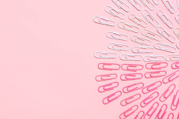 Pink and white paper clips on color background - Fotó, kép