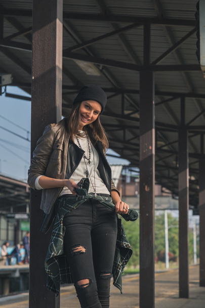 Pretty girl posing in a metro station - Фото, изображение