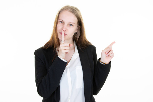 young woman pretty girl finger on lips in shh secret silence hand face gesture - Photo, Image