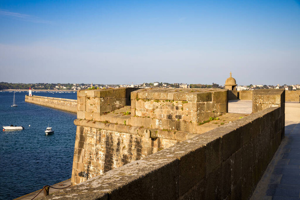 Saint-Malo lighthouse, sea and pier view from the city fortifications, Brittany, France - Photo, Image
