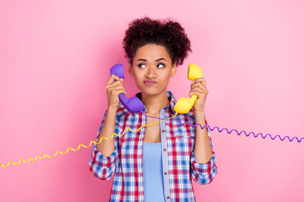 Photo of think brunette wavy hairdo lady talk telephone look promo wear plaid shirt isolated on pink color background - Φωτογραφία, εικόνα