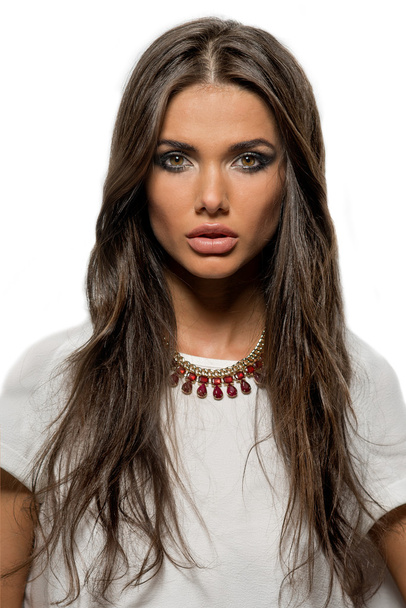 Close-up portrait of beautiful brunette woman with sexy lips and long hair - Zdjęcie, obraz