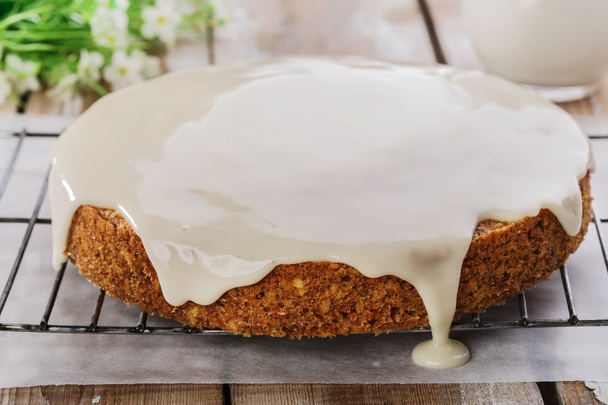 Carrot cake with nuts and cream - Photo, Image