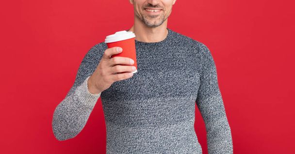 hoary man drinking coffee. male fashion model hold cup. winter fashion. morning coffee. - Фото, зображення