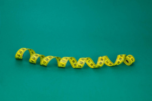 Colorful tape measure spiral with copyspace background - Photo, Image
