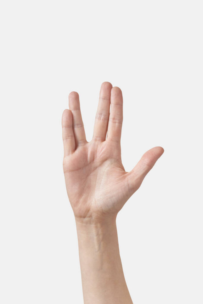 Caucasian female hand show funny weird alien peace greeting hand isolated on white background. - Φωτογραφία, εικόνα