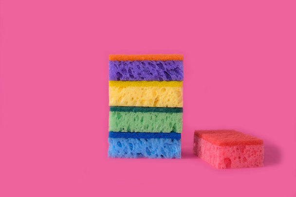 Sponges for washing dishes on a bright pink background - Photo, image