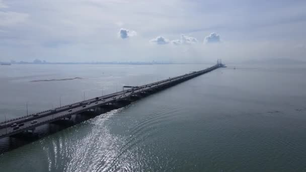 Georgetown, Penang Malaysia - May 18, 2022: The Majestic Penang Bridge, the iconic long bridge connecting Georgetown of Penang Island to the Mainland city of Butterworth. - Footage, Video