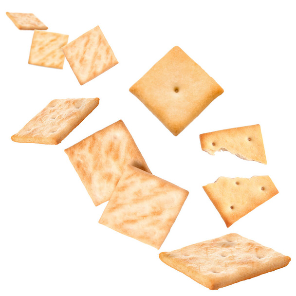 Veel knapperige crackers geïsoleerd op wit - Foto, afbeelding