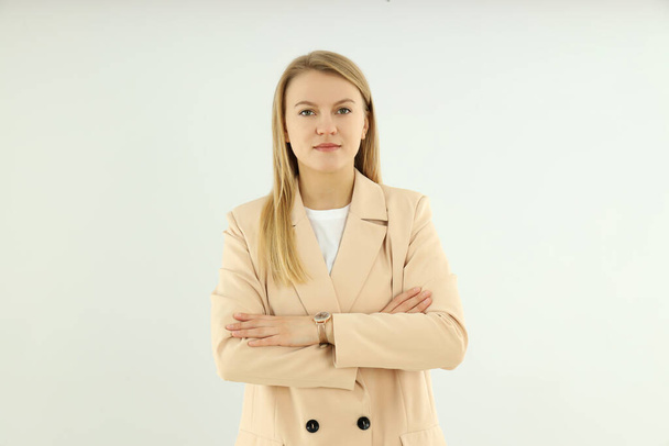 Young and attractive business woman on light background - Foto, afbeelding