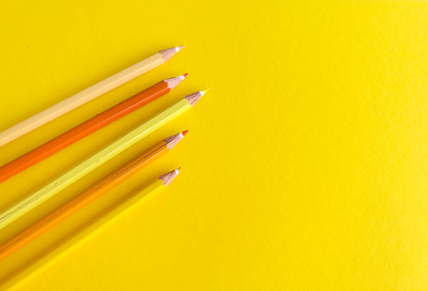 Yellow pencils with copy space on yellow background - Φωτογραφία, εικόνα