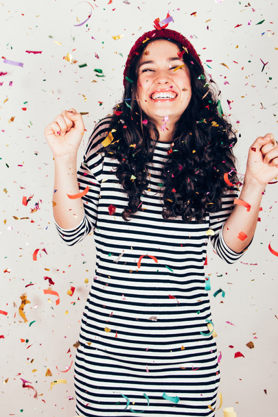 Happy party girl with confetti - 写真・画像