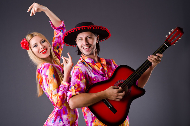Spanish pair playing guitar and dancing - Foto, Imagem