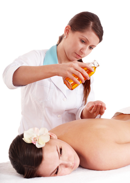Massage of beautiful young woman. - Photo, Image