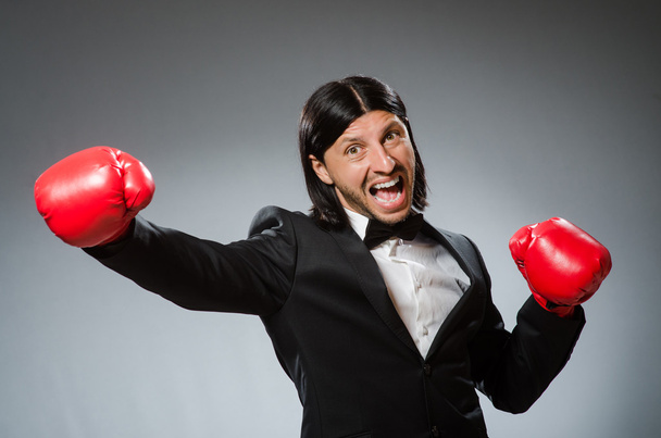 Man businessman with boxing gloves - Foto, Imagen