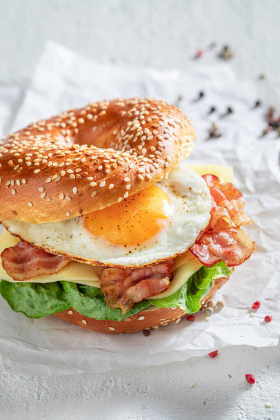Healthy and tasty bagels for tasty breakfast. Bagels as tasty sandwich with vegetables. - Photo, Image