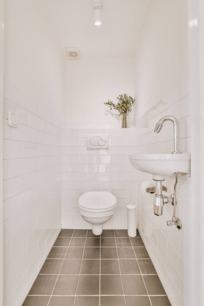 Interior of small clean restroom in miniature style - Photo, Image