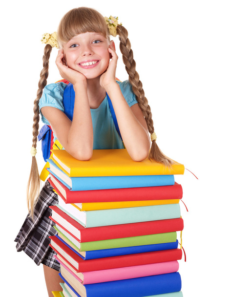 schoolmeisje met rugzak bedrijf stapel boeken. - Foto, afbeelding