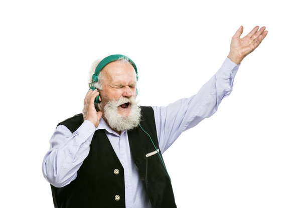Bearded man with headphones listening to music - Zdjęcie, obraz