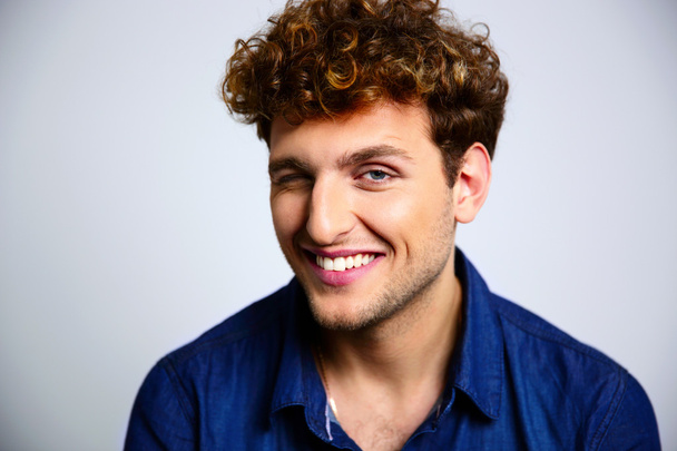 Handsome man with curly hair - Foto, Imagen
