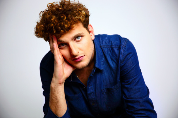Handsome man with curly hair - Foto, Imagen