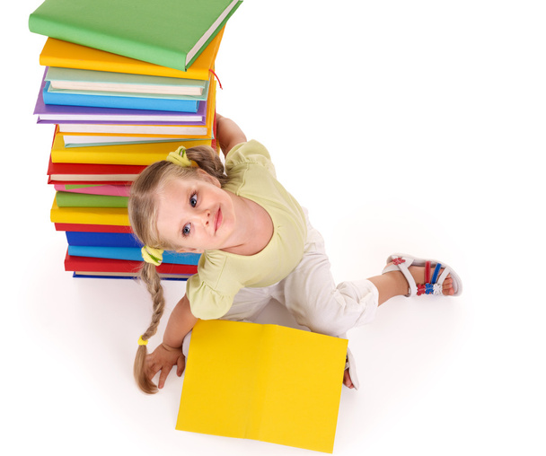 Child holding pile of books. - Fotografie, Obrázek