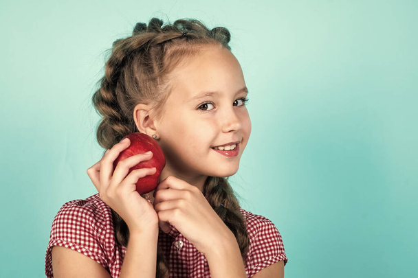 happy teen girl with red apple fruit, copy space, dieting. - Foto, Bild