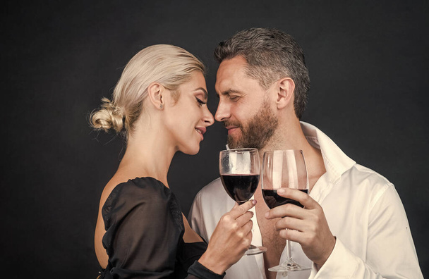 sexy couple in love of woman and man with wine glass embrace and celebrate spacial occasion, valentines day. - Foto, Imagem