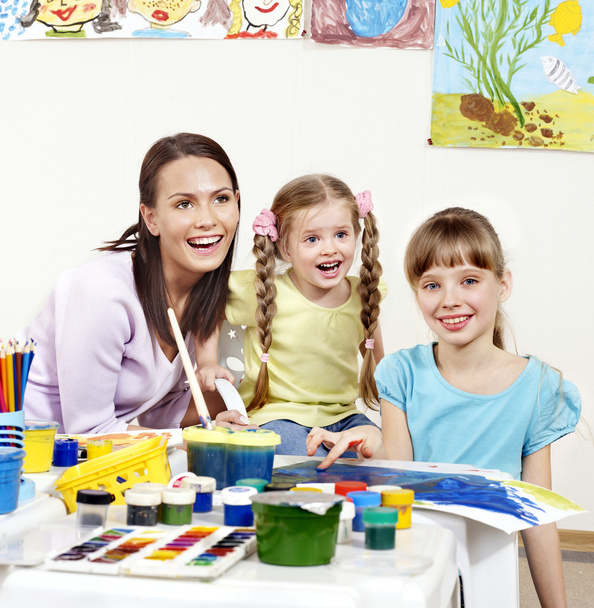 Child painting in preschool. - Foto, imagen