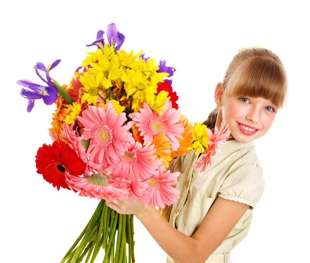 Happy child holding flowers. - Foto, imagen